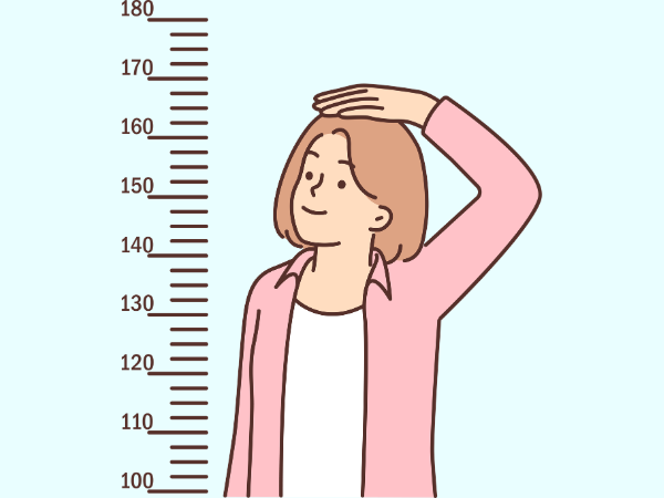 身長を計っている女性のイラスト